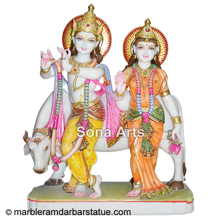 Radha krishna statue with cow
